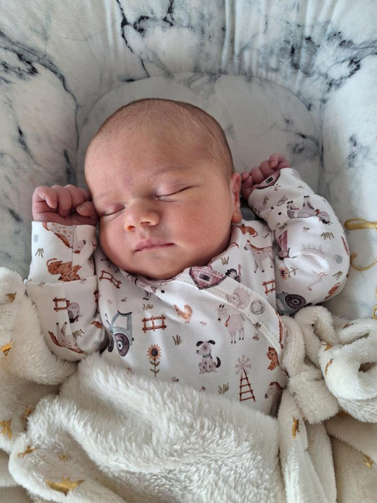 Strampler mit Bauernhoftieren