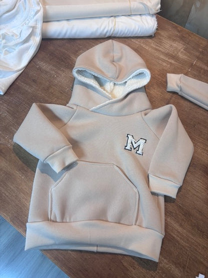 Baseball hoody personalized with teddy letter.