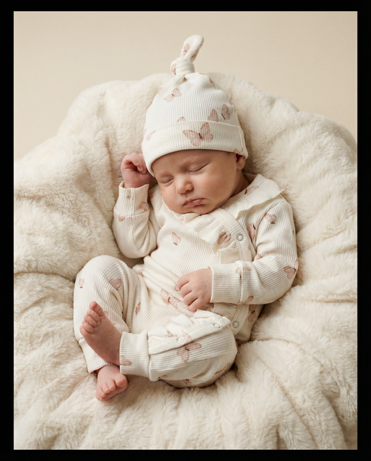 Baby romper with ribbed butterflies